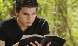 30988-youngmanreadinbible.1200w.tn