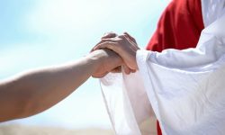 6320-jesus-in-robe-holding-hand-gettyimages-motort