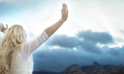 63266-thinkstock-digitalskillet-womanpraisehands.1200w.tn