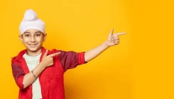 indian-sikh-pointing-towards-left-260nw-2285590949