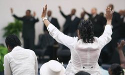 Congregation with their pastors at a revival.