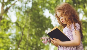web3-girl-child-bible-praying-shutterstock